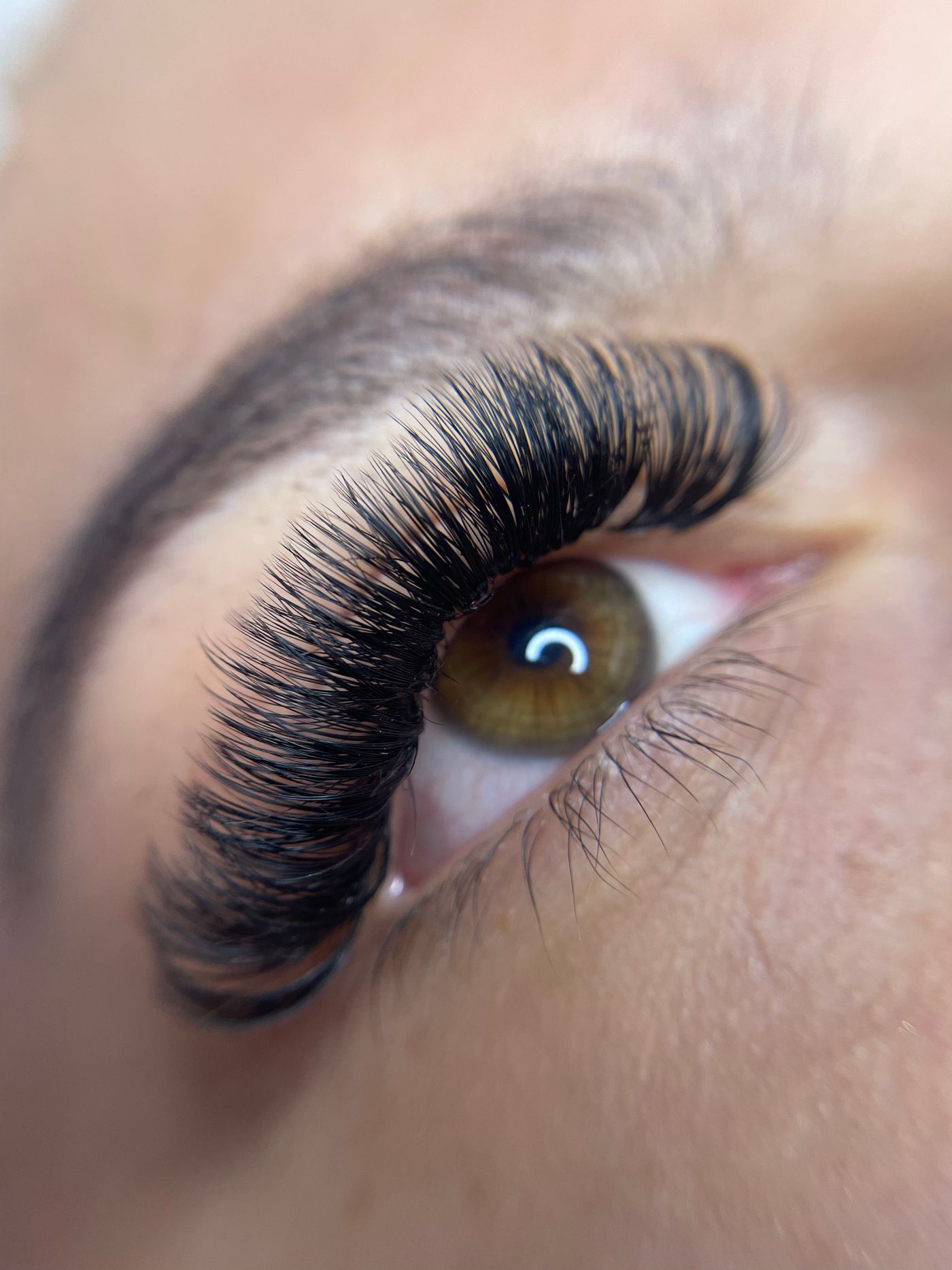 Close-up of an eye with a full set of lash extensions
